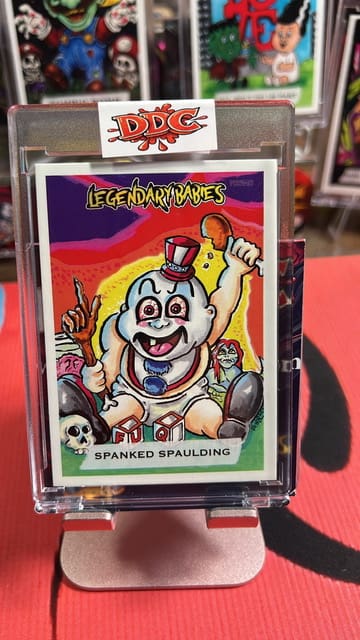 Card featuring a cartoon baby character.