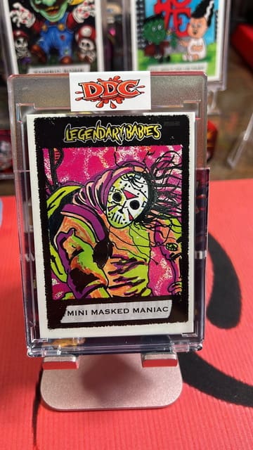 Card titled "Legendary Babies: Mini Masked Maniac.