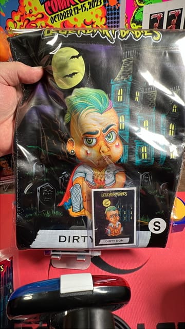 Collectible card and figure with spooky background.