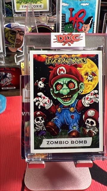 Zombie cartoon card with skulls on display.